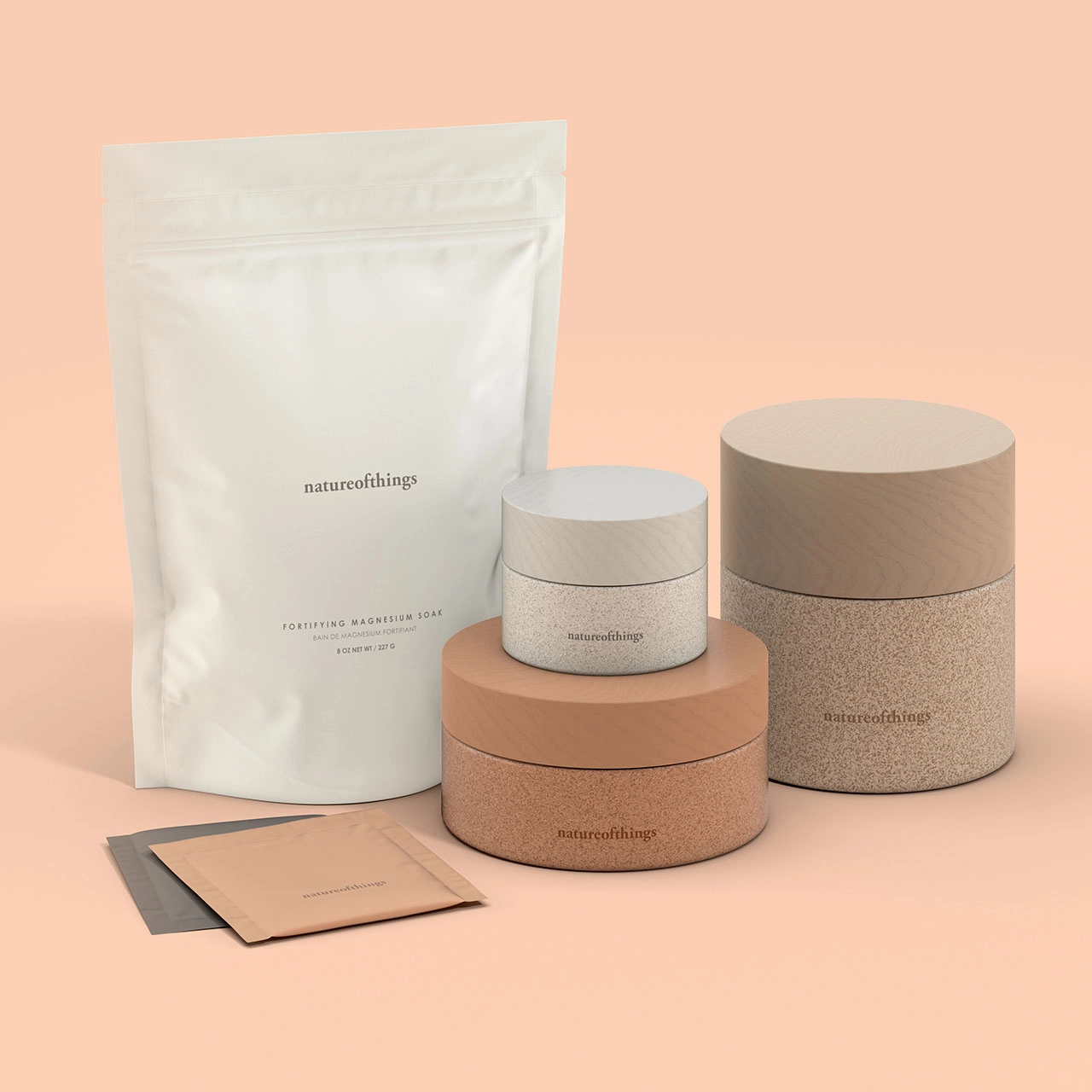 A collection of skincare products in various sizes and packaging, including a pouch and jars.