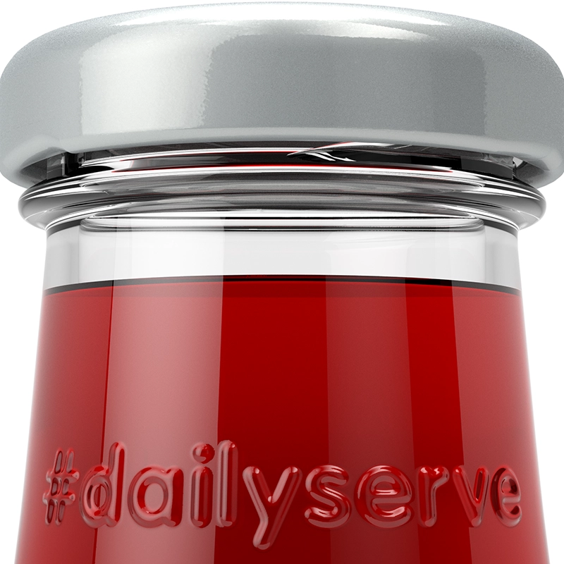 A close-up of a glass bottle with a silver lid, filled with a bright red liquid. The hashtag #dailyserve is embossed on the front of the bottle.