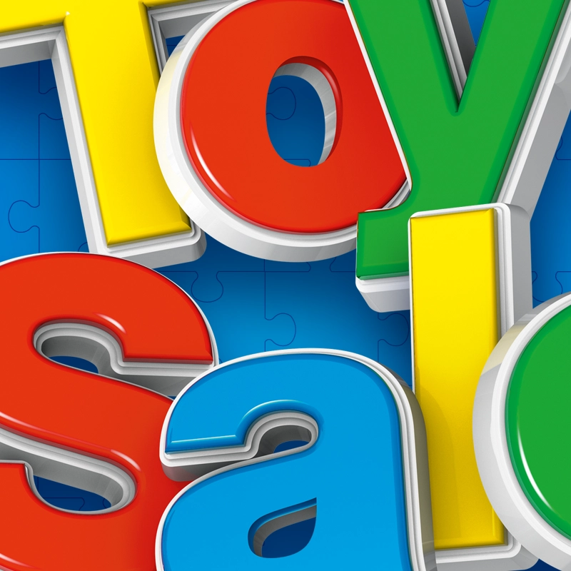 Closeup of the word "TOY SALE" spelled out in colourful 3D letters on a blue puzzle background.