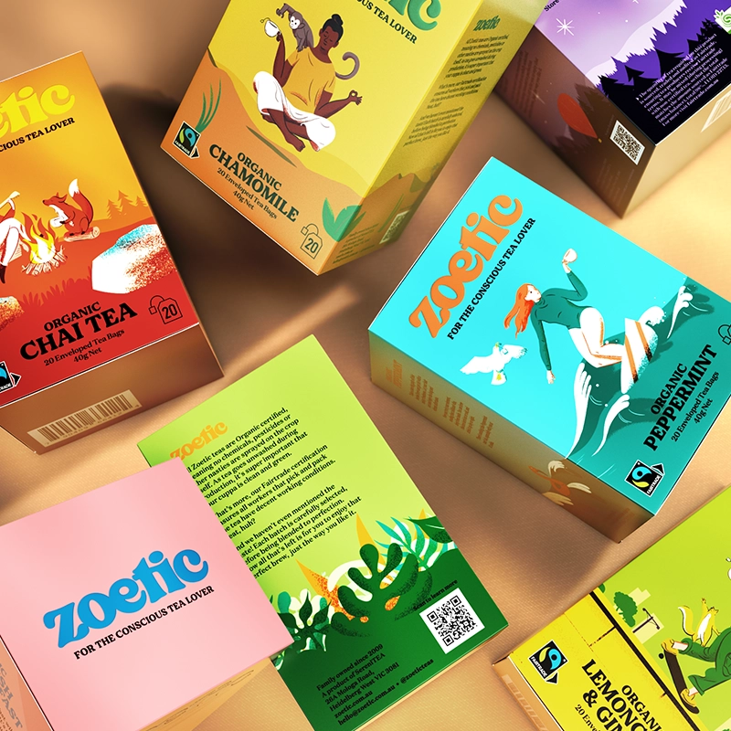 Closeup of seven colourful Zoetic tea boxes with different flavours, including chamomile, chai tea, peppermint, lemongrass & ginger, and lavender & chamomile.