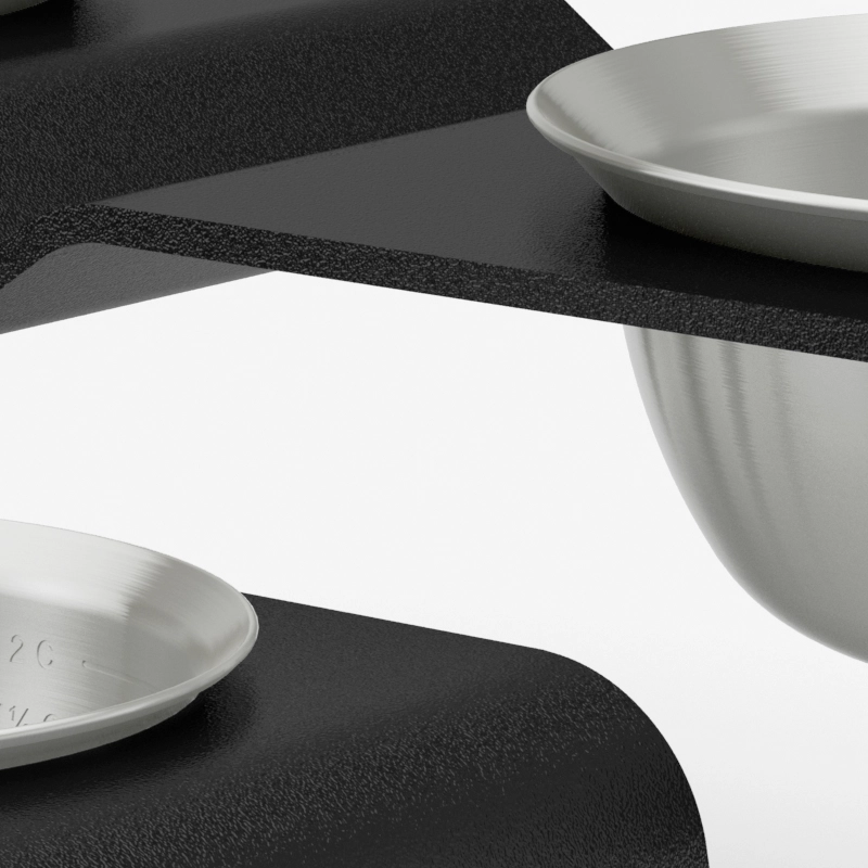 A close-up preview render of two Subwoofer dog bowls